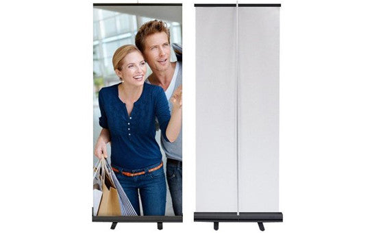 Econoroll 33point5 inch wide retractable banner stand with white back black base